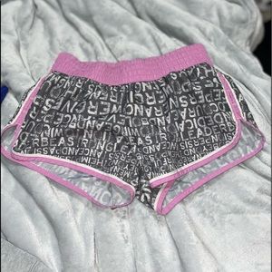 purple and grey athletic shorts